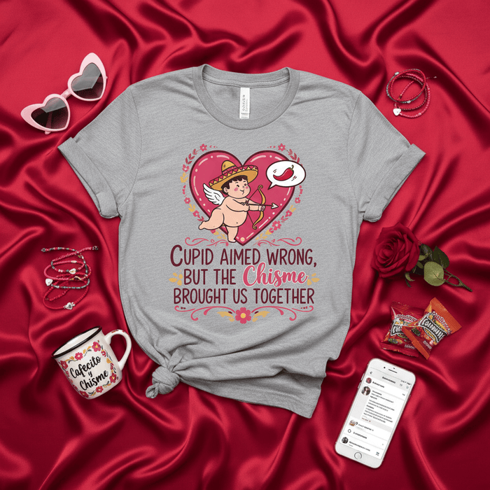 Cupid Aimed Wrong But The Chisme Brought Us Together T-Shirt | Funny Spanglish Valentine's Day Tee with Mexican Sombrero Cupid, Chile Pepper, and Heart Graphic | Latinx Couple Matching Shirt Gift Mexicada