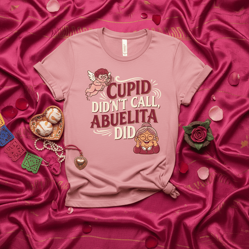 Cupid Didn't Call, Abuelita Did Funny Valentine's Day T-Shirt, Abuela Shirt, Spanish Grandma Gift, Cute Anti-Valentine Tee, Pink Unisex Top with Cupid and Abuelita Graphic Mexicada