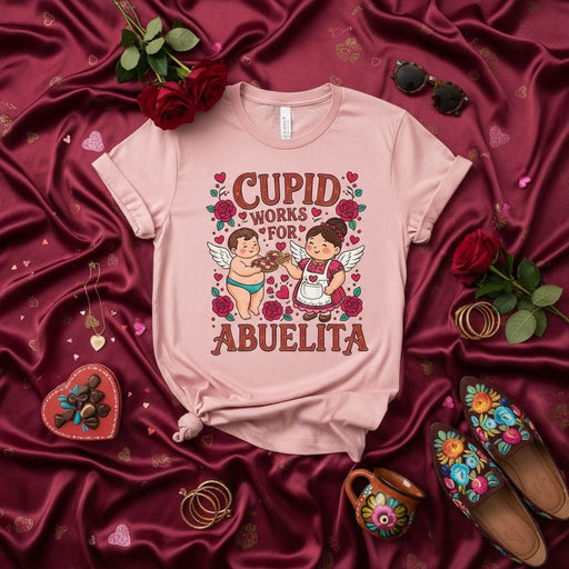 Cupid Works For Abuelita T-Shirt, Cute Spanish Grandma Tee, Valentine's Day Shirt for Abuela, Funny Latinx Grandparent Gift, Roses and Cherub Graphic Top, Mexican Heritage Family Love Shirt Mexicada