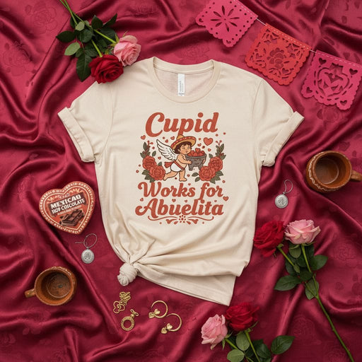 Cupid Works for Abuelita T-Shirt, Cute Valentine's Day Shirt, Funny Abuela Grandma Gift, Mexican Hot Chocolate Heart Box, Hispanic Culture Tee, Unisex Adult Shirt for Men and Women Mexicada