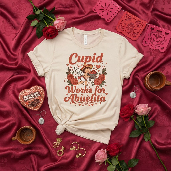 Cupid Works for Abuelita T-Shirt, Cute Valentine's Day Shirt, Funny Abuela Grandma Gift, Mexican Hot Chocolate Heart Box, Hispanic Culture Tee, Unisex Adult Shirt for Men and Women Mexicada