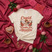 Cupid Works for Abuelita T-Shirt, Cute Valentine's Day Shirt, Funny Abuela Grandma Gift, Mexican Hot Chocolate Heart Box, Hispanic Culture Tee, Unisex Adult Shirt for Men and Women Mexicada