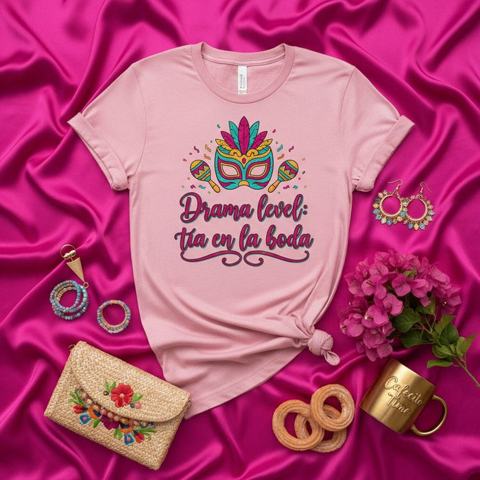Drama level: Tía en la boda Funny Spanish Quote T-Shirt, Masquerade Mask Maracas Fiesta Tee, Colorful Design Latina Gift Top, Humor Wedding Aunt Slogan Shirt, Unisex Soft Pink Graphic T-shirt Mexicada