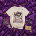 Fiesta de Fantasmas Day of the Dead Sugar Skull T-Shirt with Sombrero, Dancing Skeletons, Bats, and Halloween Marigolds on a Cream Unisex Tee Mexicada