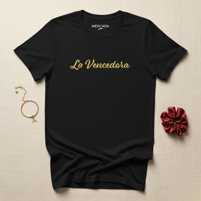 La T-Shirt da Uomo e Donna La Vencedora | Il/La Vittorioso/a, Forza, Combattente, Coraggio, Spirito Guerriero | L5