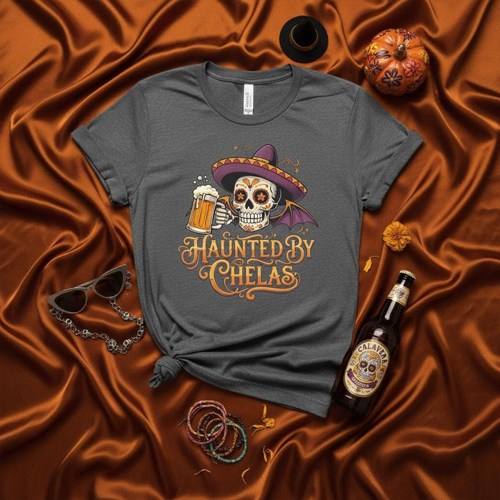 Haunted By Chelas Day of the Dead Sugar Skull T-Shirt with Sombrero, Beer Mug, and Bat Wings - Funny Halloween Calavera Graphic Tee for Men and Women Mexicada