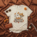 Haunted by Churros Spooky Halloween T-Shirt with Sugar Skull Sombrero and Ghostly Churro Graphic for Dia de Muertos and Fall Festivities Mexicada