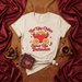 Hot Like Chiles Sweet Like Buñuelos T-Shirt, Spicy and Sweet Food Pun Shirt, Mexican Dessert Shirt, Chile Pepper Heart with Buñuelos Graphic Tee, Unisex Funny Latinx Gift Shirt, Valentine's Day Shirt, Spanish Phrase Shirt Mexicada