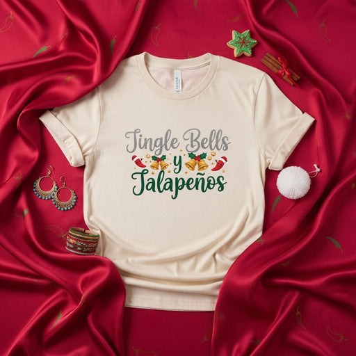 Jingle Bells y Jalapeños Christmas T-Shirt, Funny Holiday Fiesta Shirt, Unisex Xmas Tee with Glitter and Festive Bells and Pepper Graphic, Spanglish Winter Party Top Mexicada