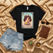 LA BELGA Lotería Card T-Shirt: Belgian Girl with Beer and Cookie Graphic Tee, Cute Latinx Bingo Game Art Shirt, Unisex Black Top with Distressed Style Design Mexicada