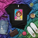 LA CHECA Lotería Card T-Shirt, Cute Girl with Pink Bow Graphic Tee, Hispanic Culture Inspired Unisex Black Shirt, Unique Mexican Bingo Game Design Apparel Mexicada