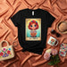 LA CHECA Mexican Loteria Card Graphic T-Shirt, Cute Cartoon Girl with Concha Bread, Traditional Game Art, Unisex Tee, Gift for Hispanic Culture Lovers Mexicada