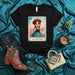 LA GAUCHA Lotería Card T-Shirt: Argentine Cowgirl, Lasso, Llama, Number 18, Cute Art, Unisex Tee, Mexican Bingo Game Inspired Apparel, Gift for Her Mexicada