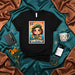 LA IRAQUÍ Loteria Card T-Shirt, Cute Cartoon Girl in Beret with Lamp and Teddy Bear, Unisex Graphic Tee, Number 13 Mexican Bingo Game Design, Unique Gift for Her Mexicada