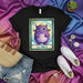 LA MOLA Cute Purple Monster Loteria Card Graphic T-Shirt | Unique Spanish Bingo Game Inspired Tee | Fantasy Creature Design Unisex Shirt | Kawaii Cartoon Style Apparel Gift Mexicada