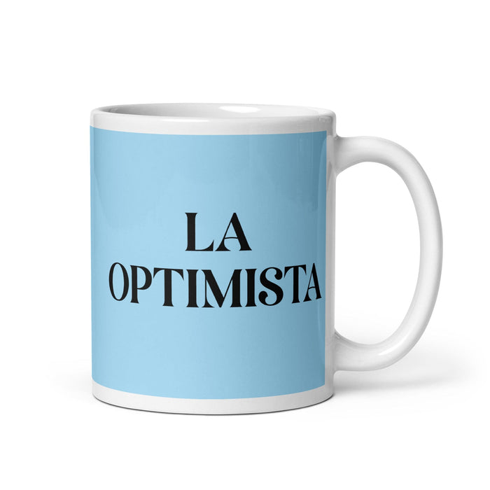 La Optimista The Optimistic One Funny Home Office Work Coffee Mug Mexican Spanish Pride Gift White Glossy Cup Sky Blue Card Mug Mexicada 11 oz