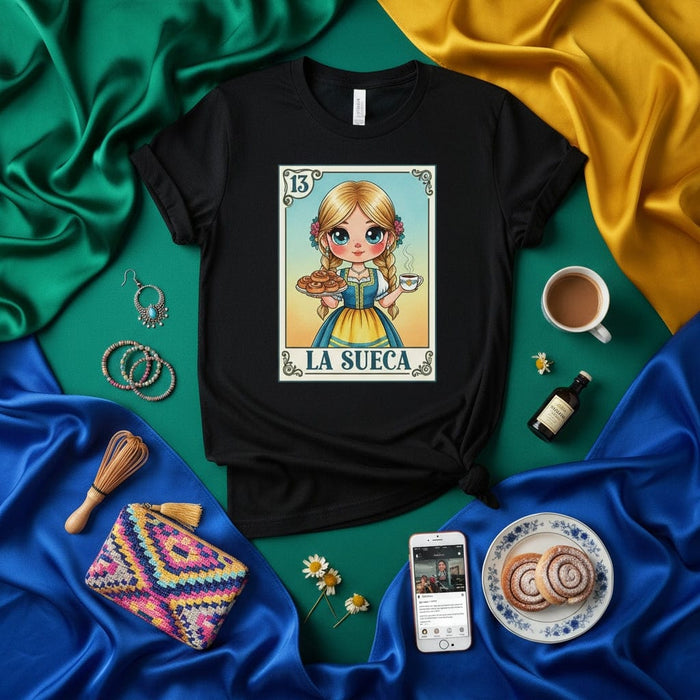 LA SUECA Loteria Card T-Shirt, Cute Blonde Girl in Traditional Dress with Cinnamon Rolls and Coffee, Funny Mexican Bingo Game Inspired Tee, Unisex Graphic Shirt, Number 13 Design Mexicada