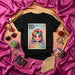 LA VIVA Rainbow Floral Crown Girl Loteria Card T-Shirt, Mexican Bingo Game Inspired Graphic Tee, Number 12 Music Notes Design, Hispanic Culture Gift, Unisex Black Shirt Mexicada