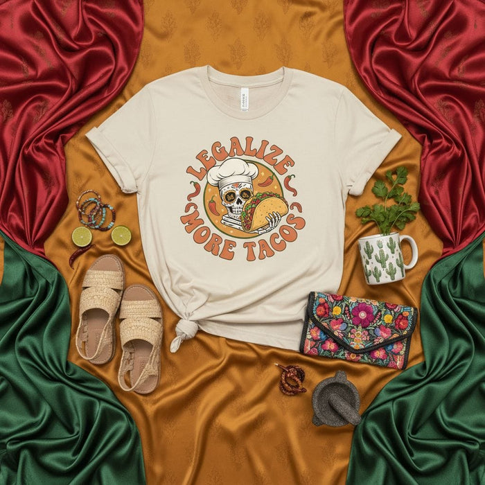 Legalize More Tacos T-Shirt: Chef Skull Holding Taco Design, Unisex Graphic Tee, Foodie Humor, Mexican Culture Inspired Apparel, Beige Soft Fabric Shirt Mexicada