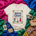 Lotería Queen T-Shirt, Mexican Bingo Game Card Inspired Tee, Latina Style Shirt with La Sirena, La Luna, La Dama, Loteria Game, Colorful Folk Art Design, Unisex Graphic Top Mexicada