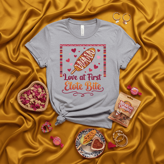 Love at First Elote Bite Unisex T-Shirt, Cute Corn on the Cob Tee, Mexican Street Food Shirt, Elote Lover Gift, Valentine's Day Heart Design, Foodie Apparel, Graphic T-shirt for Men & Women Mexicada