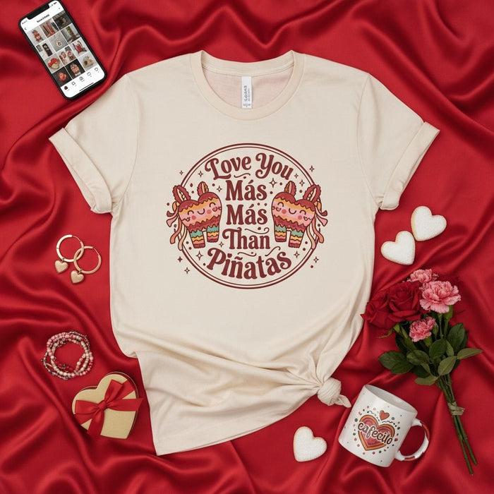 Love You Más Más Más Than Piñatas Shirt, Valentine's Day T-Shirt, Fiesta Heart Pinata Graphic Tee, Cute Latinx Spanish Gift, Unisex Beige Cream Top Mexicada