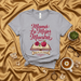 Mamá La Mejor Maestra Feliz Día de las Madres T-Shirt | Spanish Mother's Day Gift for Best Teacher Mom | Regalo para Mamá Maestra | Women's Short Sleeve Tee with Book and Apple Design Mexicada