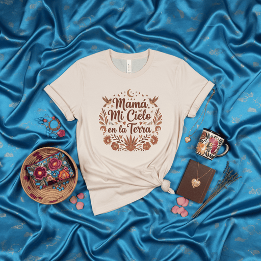 Mamá Mi Cielo en la Tierra Spanish T-Shirt for Mom, Mother's Day Gift Tee, Celestial Folk Art Boho Style Shirt with Flowers and Moon, Beige Unisex Graphic Top for Latina Moms and Grandmas Mexicada