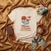 Mamá Mi Sonrisa Hecha Persona T-Shirt, Mother's Day Gift, Hummingbird Marigold Flower Tee, Spanish Quote Shirt for Mom, Regalo para Mamá, Mexican Culture Inspired Graphic T-Shirt, Beige Unisex Shirt Mexicada