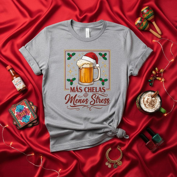 Más Chelas Menos Stress Christmas Beer T-Shirt, Funny Holiday Santa Hat Mug Graphic Tee, Unisex Spanish Party Shirt, Xmas Drinking Celebration Gift Idea Mexicada