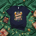 Más Chelas Menos Stress T-Shirt | Funny Spanish Beer & Cannabis Leaf Graphic Tee | Unisex Holiday Party Shirt | Navidad Gift Idea Mexicada