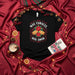 Más Tamales Más Amor T-Shirt | Holiday Mexican Food Poinsettia Christmas Tee | Unisex Latinx Shirt with Tamal and Piloncillo Iconography Mexicada