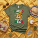 NACHO AVERAGE MEXA Funny T-Shirt, Cute Cartoon Nacho Chip with Sombrero Thumbs Up, Mexican Pride Pun Tee, Cinco de Mayo Party Shirt, Novelty Food Lover Gift, Unisex Olive Green Graphic Shirt Mexicada