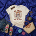Ní PEDO Así Se Vive Sugar Skull T-Shirt, Día de Muertos Floral Calavera Tee, Mexican Culture Shirt, Boho Summer Unisex T-shirt with Espadrilles and Shorts, Festival Apparel. Mexicada