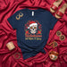Nochebuena but Make It Spicy Sugar Skull T-Shirt with Santa Hat, Chili Peppers, and Poinsettias - Dia De Muertos Christmas Holiday Shirt for Men & Women, Unisex Festive Apparel Mexicada