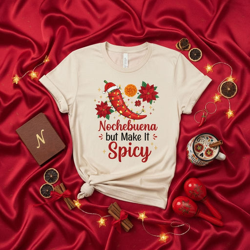 Nochebuena but Make It Spicy T-Shirt - Christmas Chili Pepper Tee with Santa Hat, Poinsettias, and Marigold - Funny Holiday Shirt Gift - Unisex Fiesta Apparel Mexicada