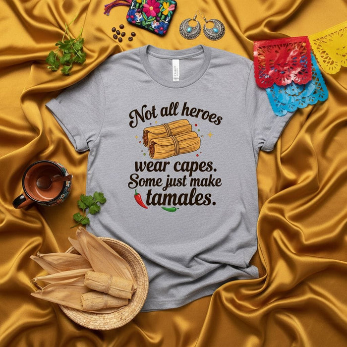 Not all heroes wear capes. Some just make tamales. Funny Mexican Food Shirt, Tamale Maker Gift, Hispanic Culture T-Shirt, Cinco de Mayo Apparel, Foodie Tee, Tamal Lover Unisex Top. Mexicada