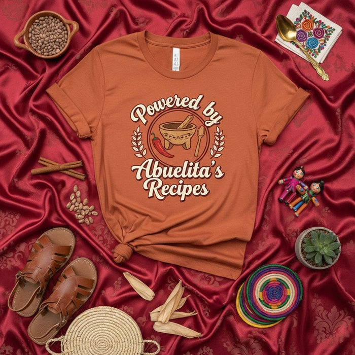 Powered by Abuelita's Recipes T-Shirt Unisex, Grandma's Cooking Latinx Foodie Shirt, Molcajete Chili Pepper Spoon Graphic Tee, Cultural Heritage Gift for Hispanic & Mexican Grandmothers and Grandsons/Granddaughters Mexicada