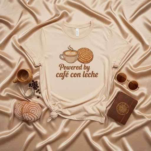 Powered by Café Con Leche Shirt, Concha Pan Dulce Tee, Hispanic Coffee Lover Gift, Mexican Sweet Bread T-Shirt, Pastel Cream Unisex Crewneck Top, Latinx Foodie Apparel Mexicada