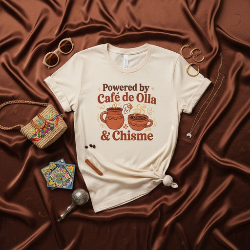 Powered by Café de Olla & Chisme T-Shirt, Coffee Lover Gift, Mexican Culture Shirt, Spanish Phrase Tee, Latina Power, Funny Coffee Gossip Shirt, Unisex Graphic T-Shirt Mexicada