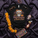 Puro Halloween y Puro Pāri T-Shirt, Sugar Skull Día de Muertos Halloween Party Shirt, Calavera with Bat Wings and Marigolds Unisex Tee Mexicada