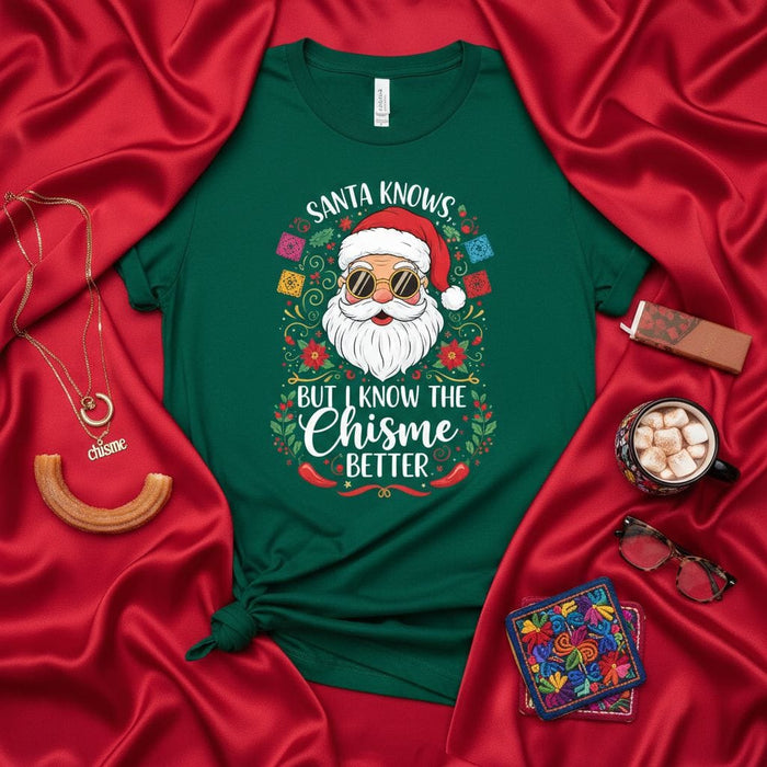 Santa Knows But I Know The Chisme Better T-Shirt | Funny Latinx Christmas Holiday Shirt with Papel Picado Santa Claus | Cute Spanish Mexican Culture Tee Gift Mexicada