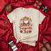 Santa's Favorite Tía Shirt, Funny Christmas Mexican Fiesta T-Shirt, Sombrero Santa Maracas Xmas Holiday Tee, Family Aunt Gift, Cute Poinsettia Lights Graphic Unisex T-Shirt Mexicada