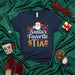 Santa's Favorite Tía T-Shirt, Funny Mexican Christmas Family Tee, Spanish Aunt Holiday Shirt with Sombrero Reindeer and Poinsettias, Cute Latina Christmas Gift Idea for Tía Mexicada