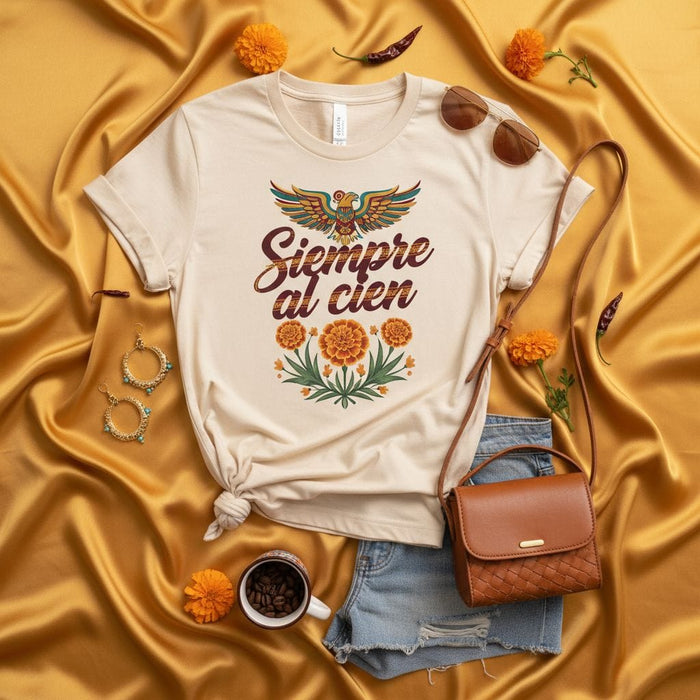 Siempre al cien Marigold Eagle Unisex T-Shirt, Día de Muertos Inspired Tee, Mexican Phrase Shirt, Floral Graphic Top for Him and Her Mexicada