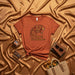 Siempre con hambre Jaguar Leopard T-Shirt | Spanish Phrase | Boho Floral Graphic Tee | Unisex Burnt Orange Shirt | Hispanic Heritage Month Gift Idea Mexicada