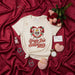 Single But Sabrosa T-Shirt, Día de San Valentín Sugar Skull Tee, Funny Anti-Valentine's Day Shirt, Calavera with Roses Heart Graphic, Unisex Latinx Gift for Her or Him Mexicada
