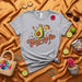 Taco-holic T-Shirt, Cute Avocado King Holding a Taco and Star, Funny Mexican Food Graphic Tee, Unisex Grey Short Sleeve Shirt, Cinco de Mayo Outfit Mexicada