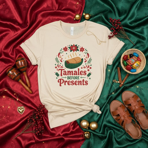 Tamales Before Presents Christmas T-Shirt, Unisex Holiday Tamale Shirt, Festive Mexican Food Tee, Family Celebration Gift, Poinsettia Wreath Design, Short Sleeve, Beige Color, Seasonal Apparel Mexicada