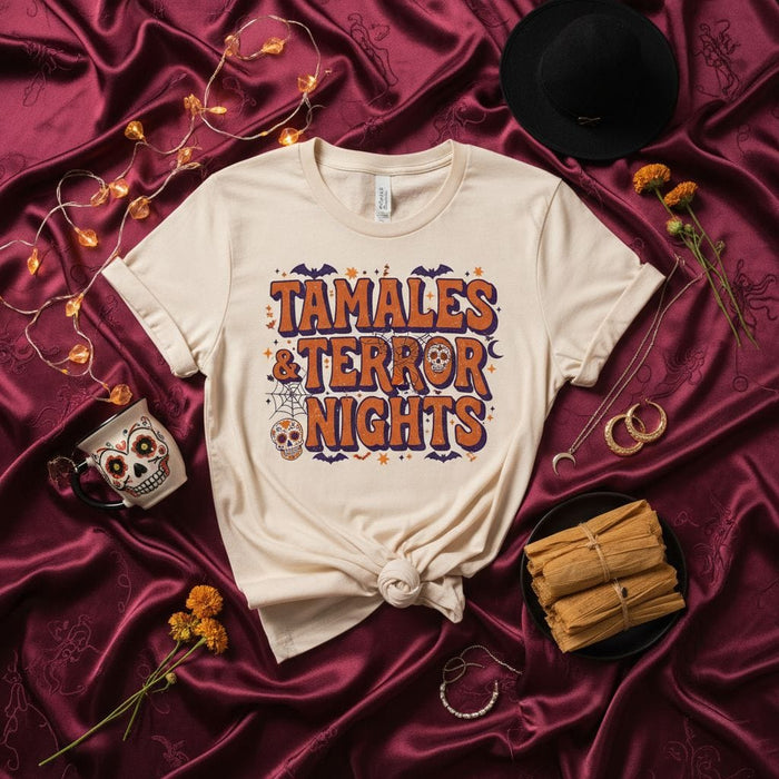 Tamales & Terror Nights Spooky Halloween T-Shirt with Sugar Skulls, Bats, and Spiderwebs, Dia de Muertos Hispanic Food Lover Holiday Party Unisex Tee Gift Mexicada
